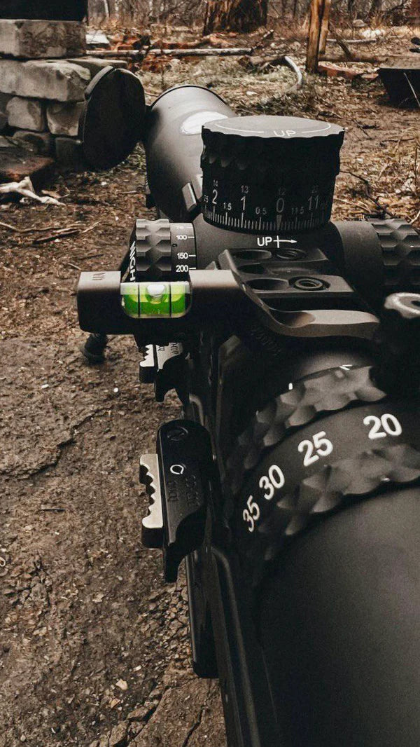Forskyv vater for riflekikkert 